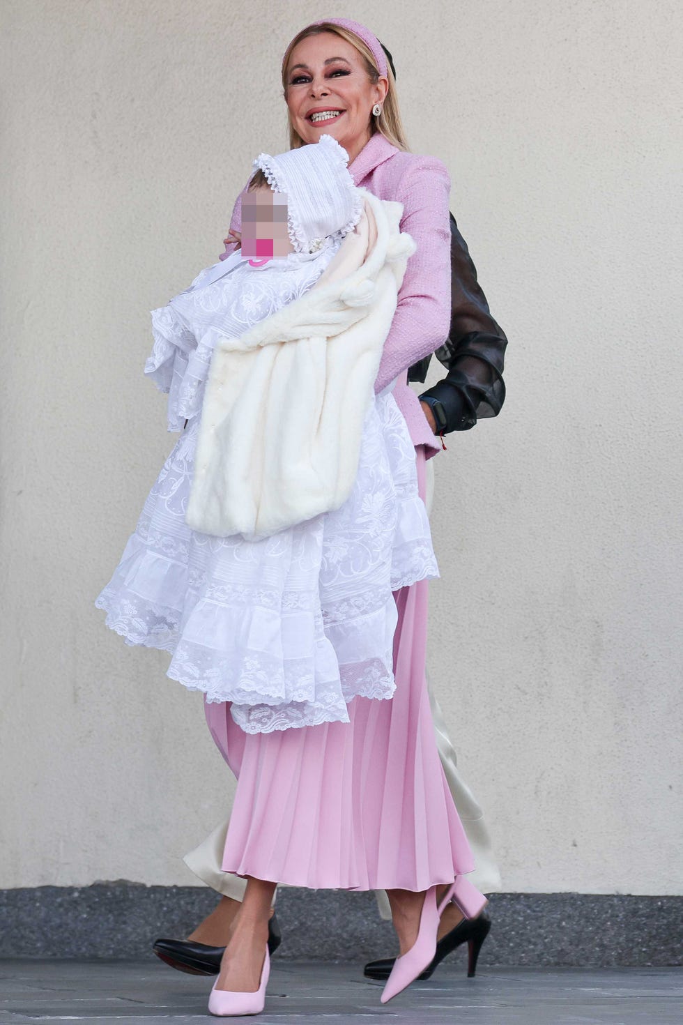 a woman in a pink dress