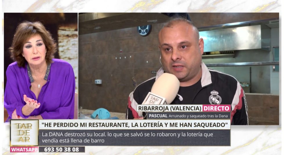 la presentadora escucha el testimonio de pascual dueno de un bar destrozado en ribarroja