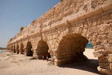 ancient roman aqueduct at caesarea, israel