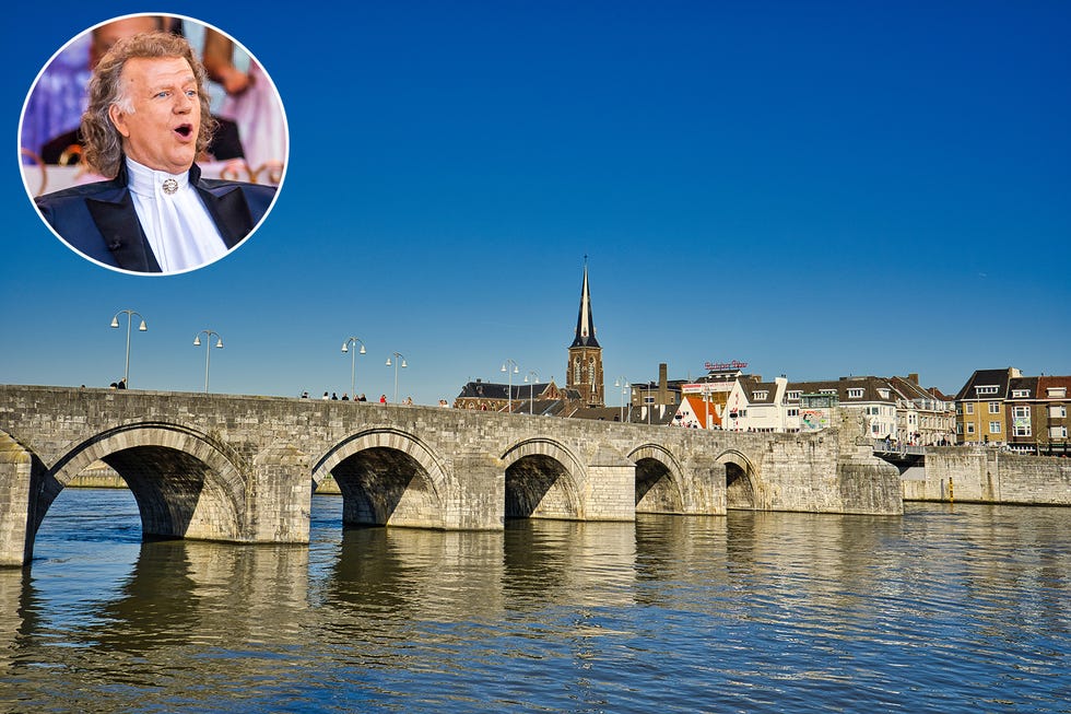 the meuse river on their way through maastricht, netherlands in march 2019