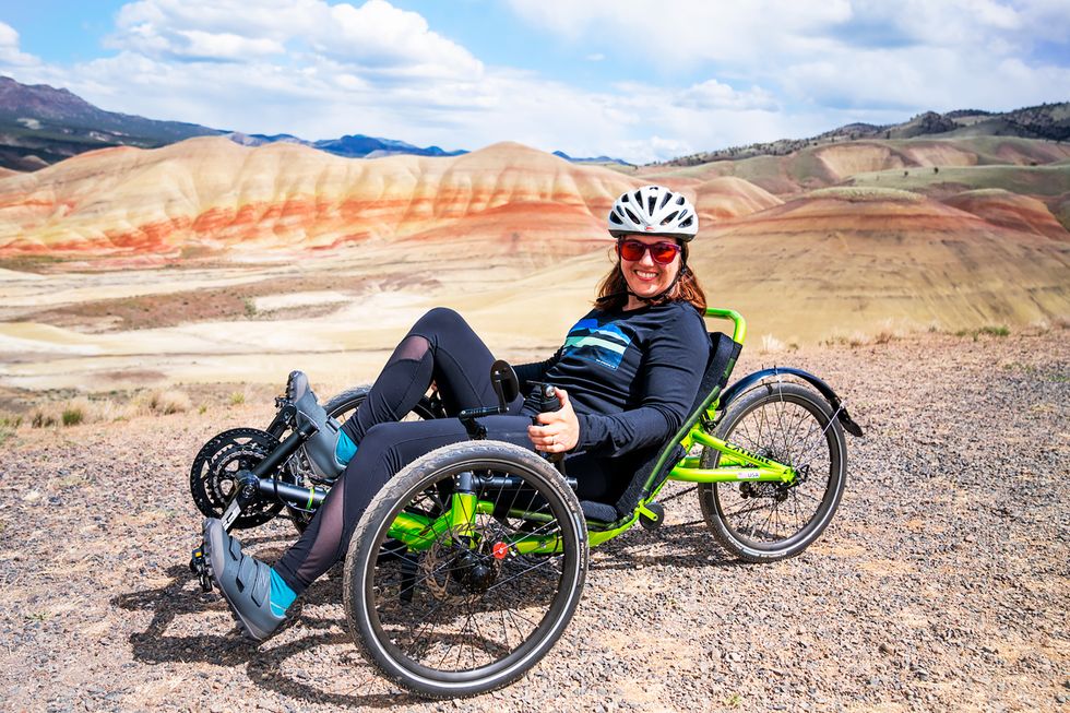 andrea lytle peet on a trail in a recumbent trike