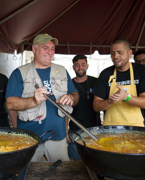 Chef Jose Andres and volunteers with World Central Kitchen prepare paella in San Juan, Puerto Rico.