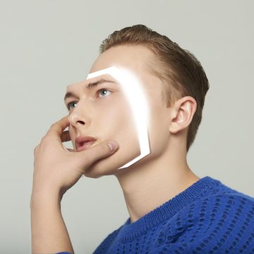 android man removing his face