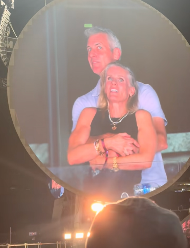 a couple embracing and enjoying an event