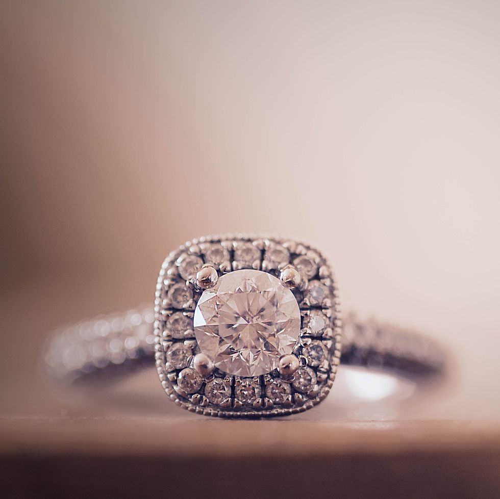 Close-Up Of Diamond Ring On Table
