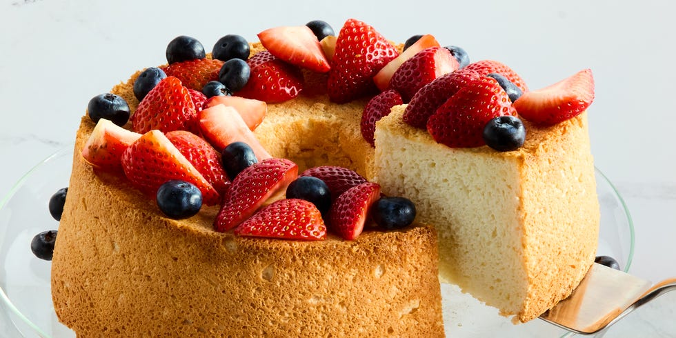 angel food cake topped with strawberries and blueberries