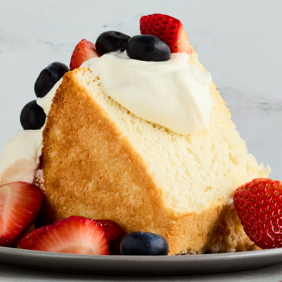 angel food cake topped with strawberries and blueberries