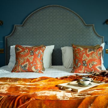Bedroom, Bed, Furniture, Bedding, Orange, Room, Bed sheet, Bed frame, Interior design, Pillow, 