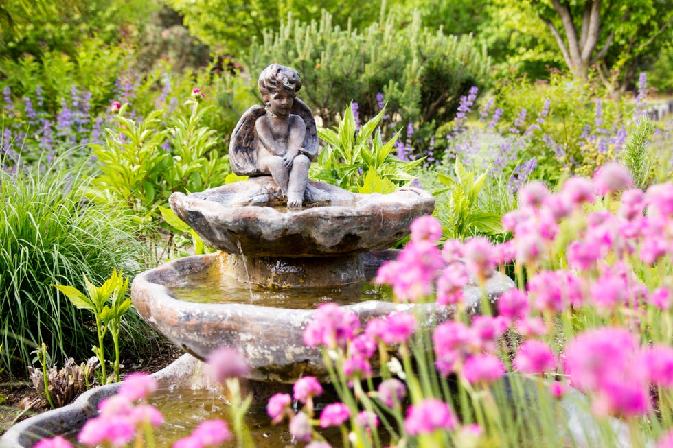 angel statue fountain in garden