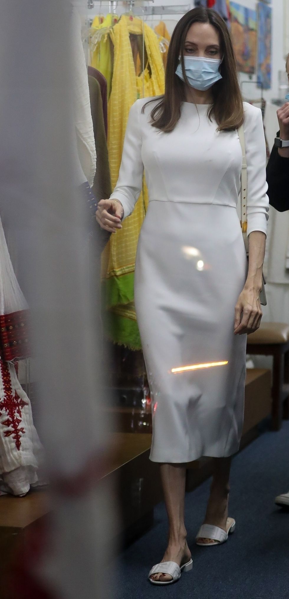 Angelina Jolie Is Stunning in a Tailored White Dress & Fendi Slides