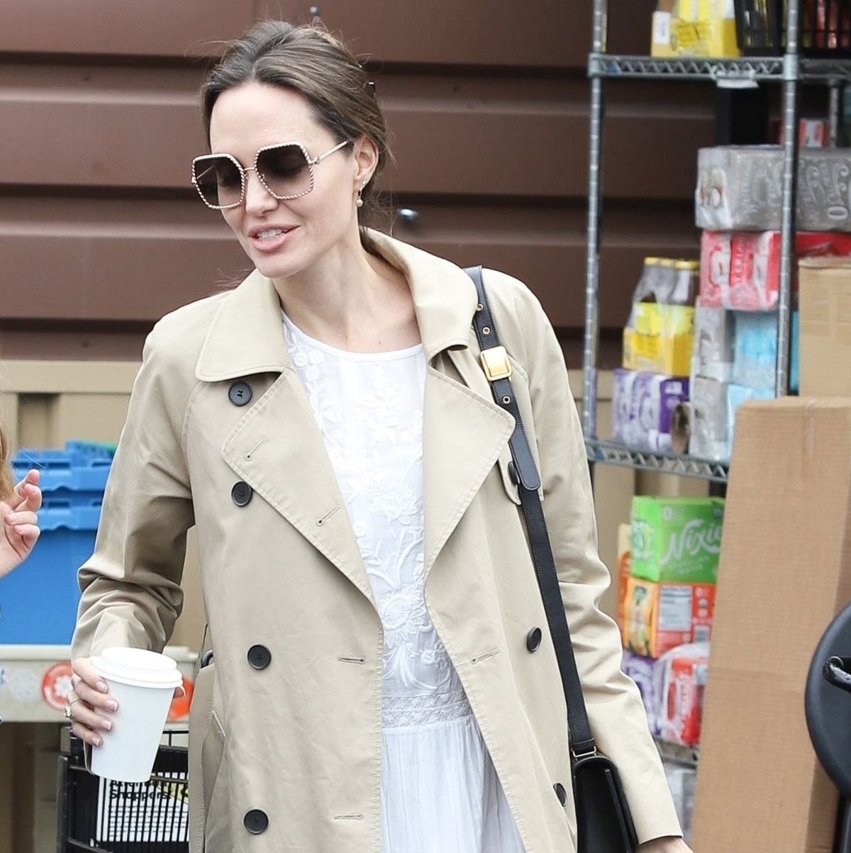 Angelina Jolie Goes Grocery Shopping with Daughter in .