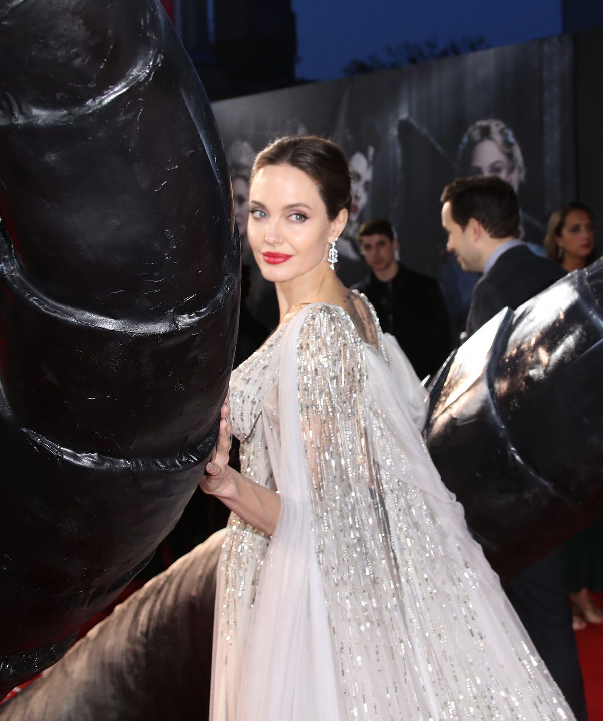 Angelina Jolie Wears a White Gown to Maleficent London Premiere