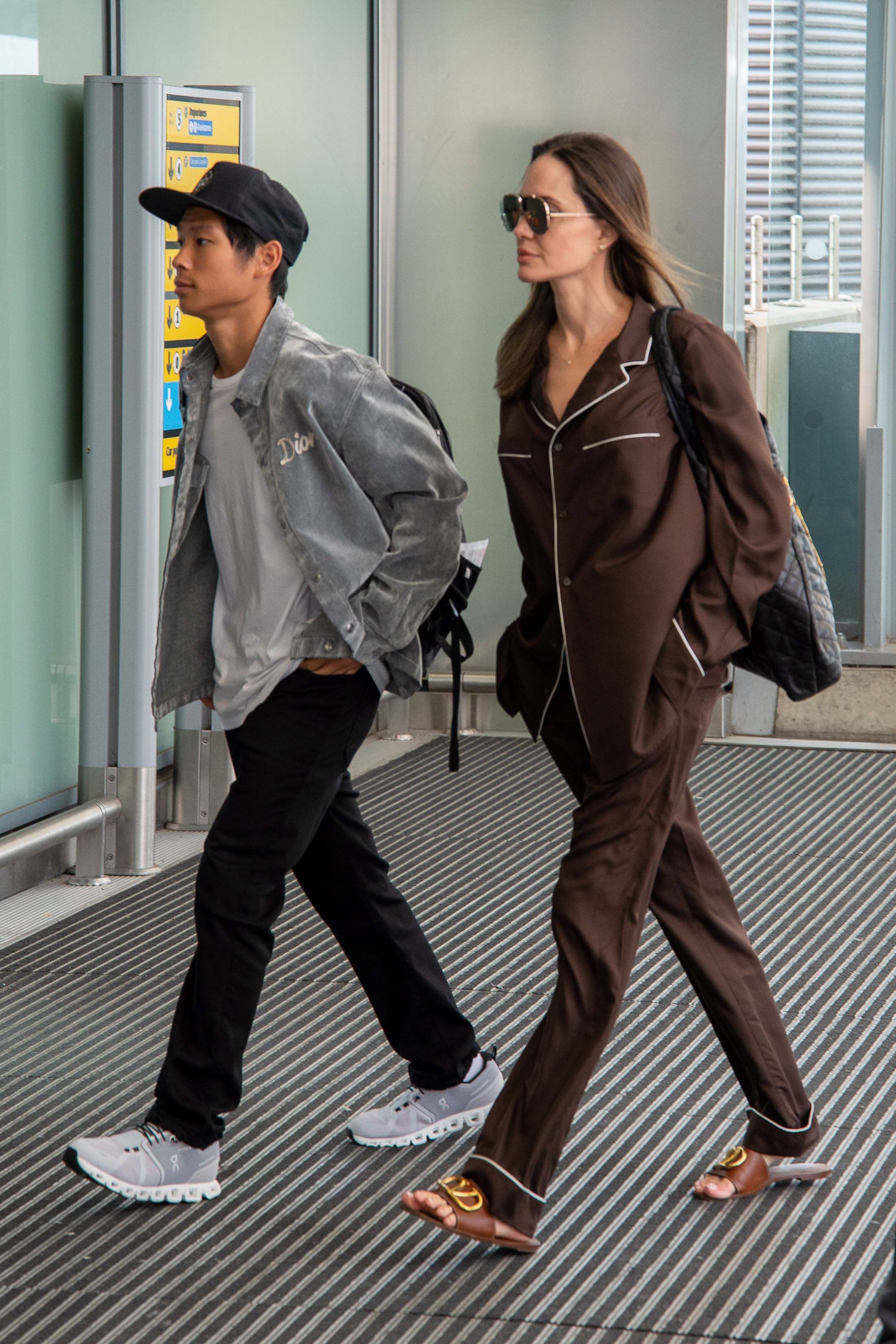 Angelina Jolie wears her pyjamas to the airport