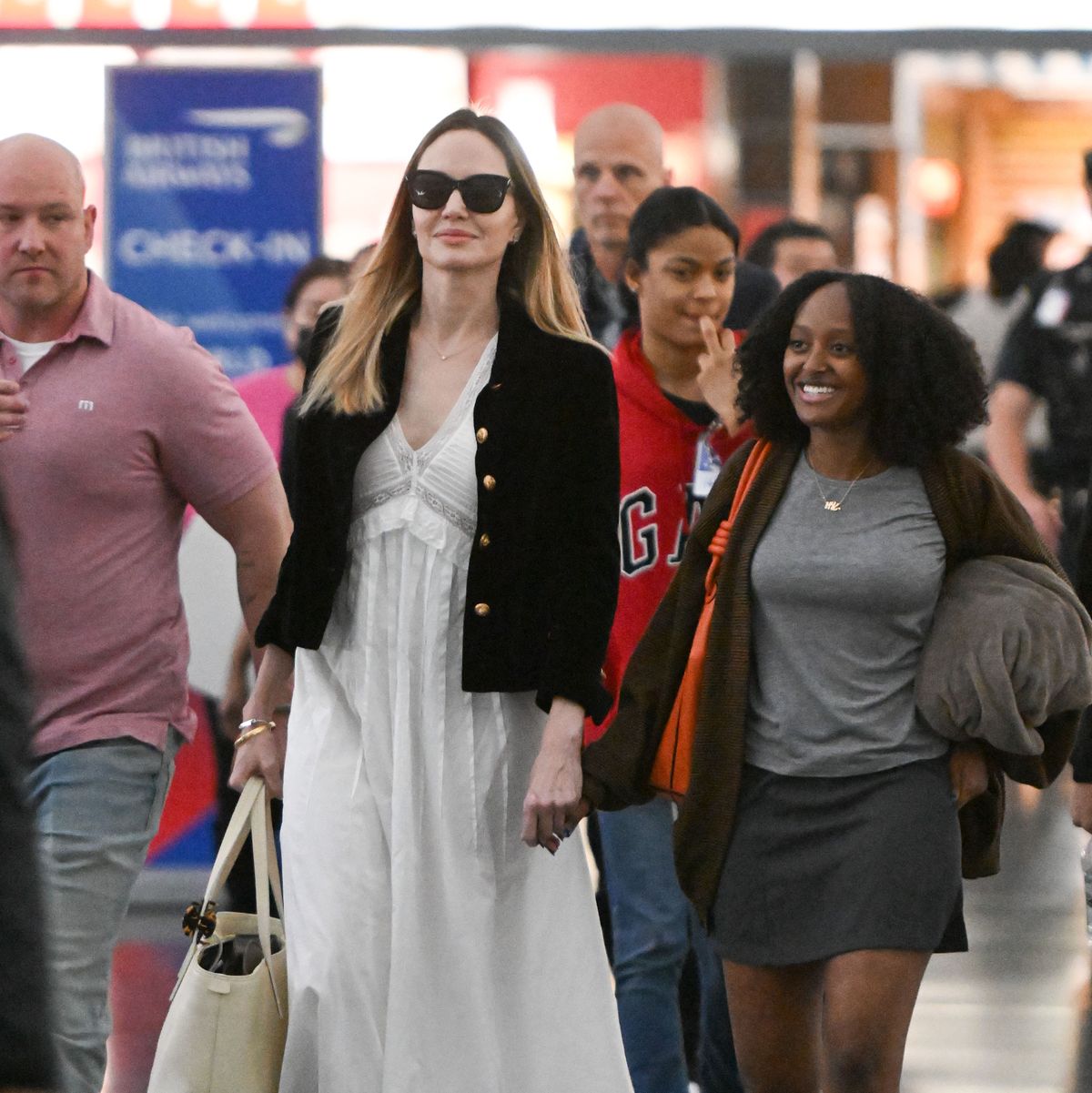 Angelina Jolie's Monochromatic Airport Look Emphasizes Style & Comfort