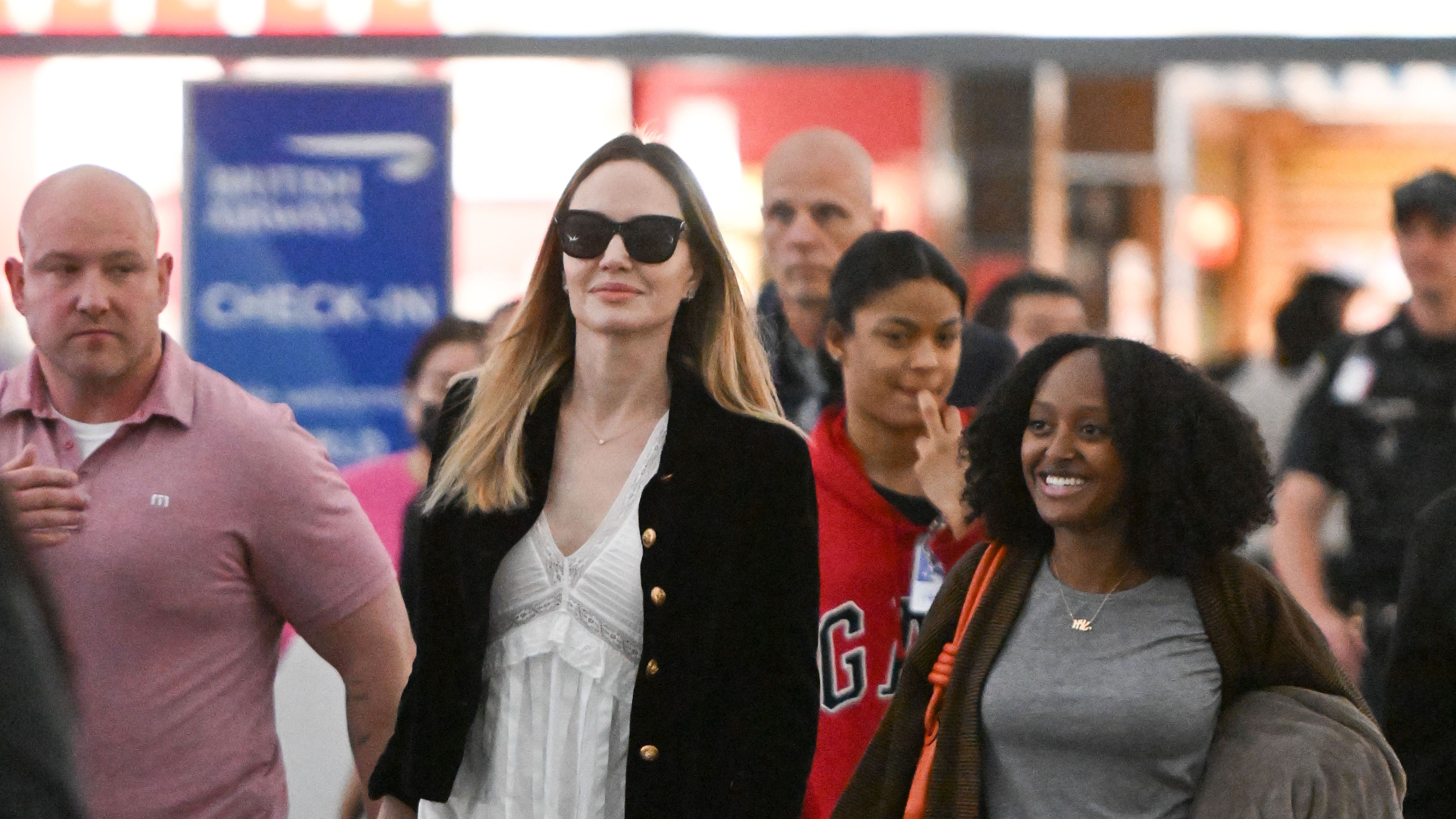 Angelina Jolie's Monochromatic Airport Look Emphasizes Style & Comfort