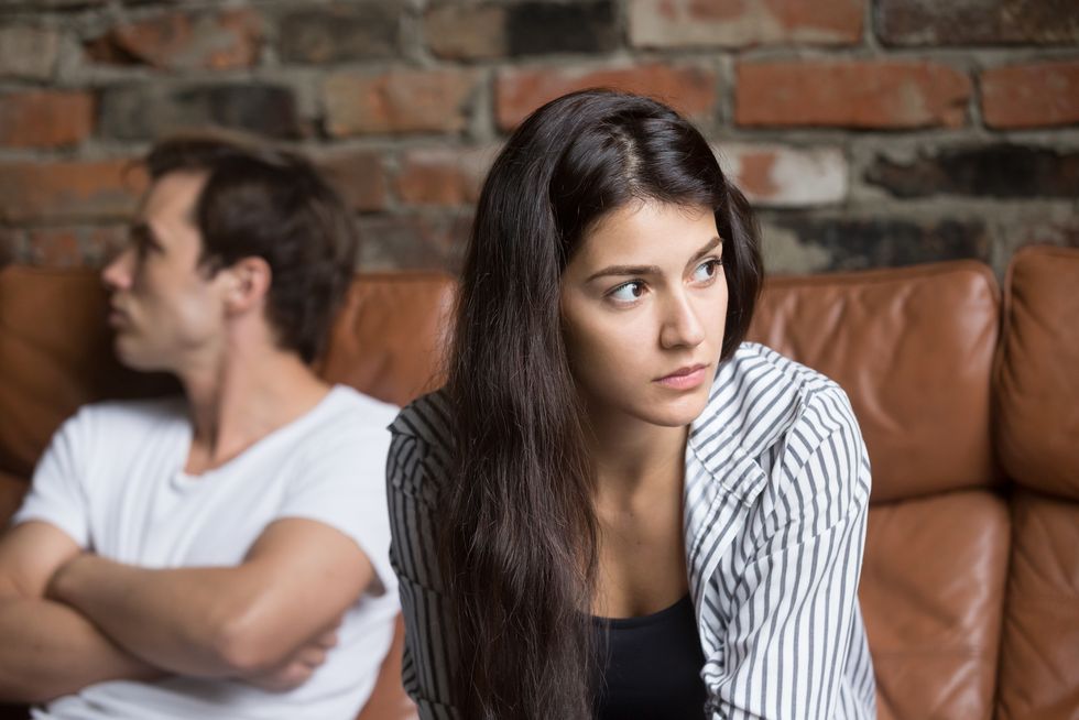 angry couple avoiding talking after family fight