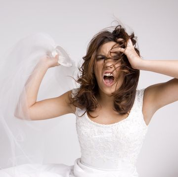 angry screaming bride throwing veil