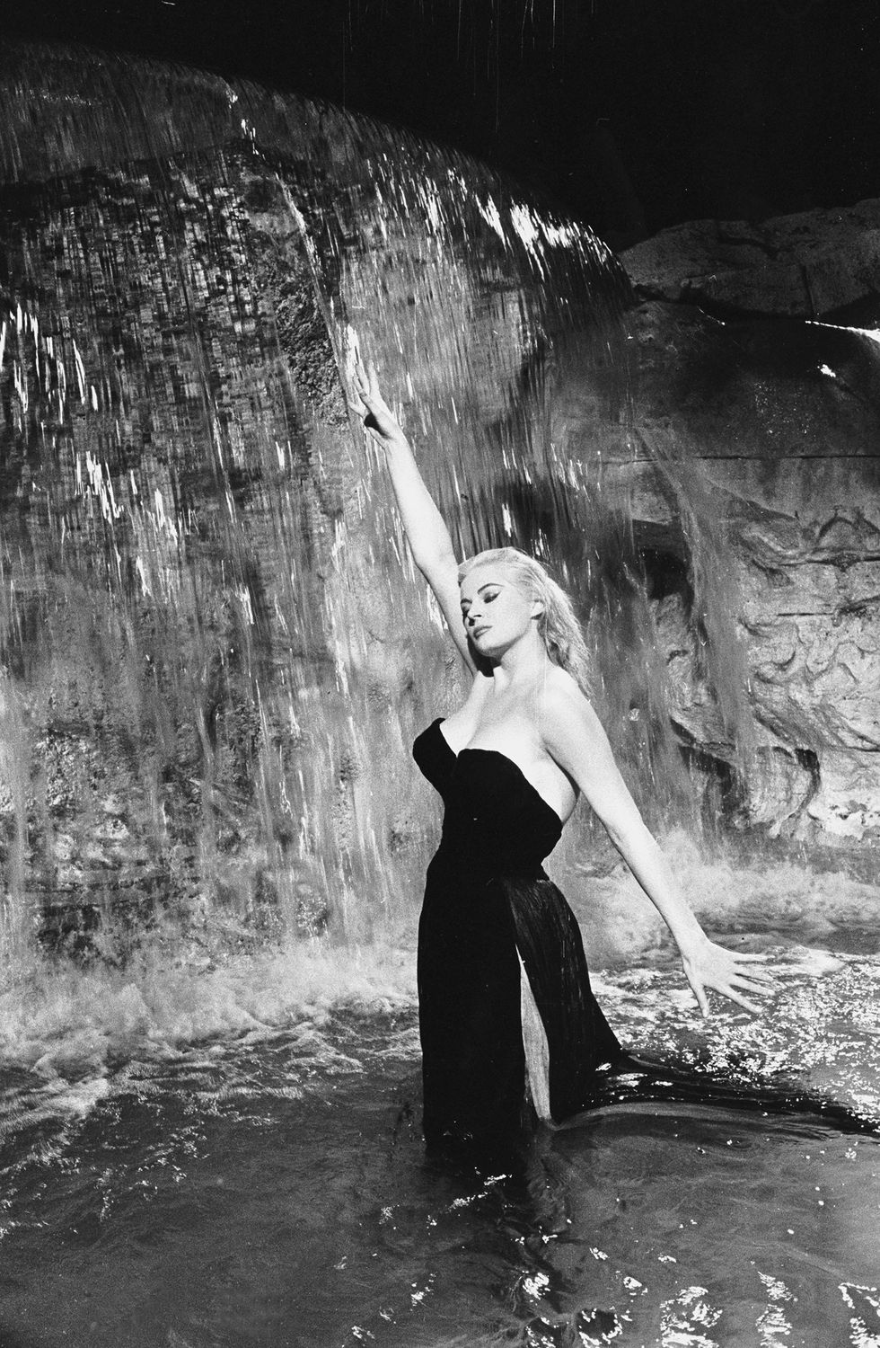 1960  swedish actress anita ekberg plays the glamorous sylvia in the fountain scene from 'la dolce vita', directed by federico fellini  photo via john kobal foundationgetty images