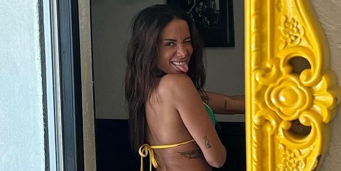 Anitta’s Teeny Tiny String Bikini Coordinates With Her… Yellow Fridge?