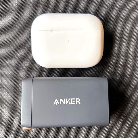 anker 735 charger next to airpods case