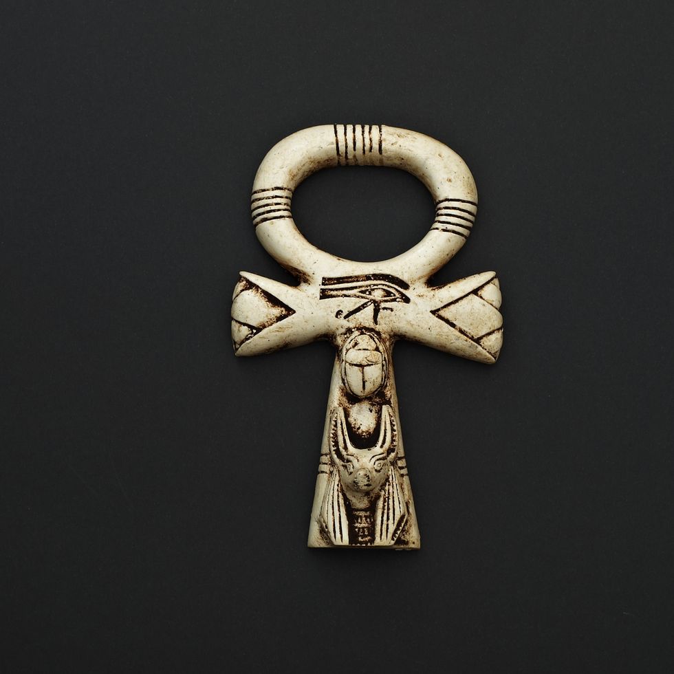 ankh is an ancient egyptian symbol for lifeimmortality and death,male and female with the eye of  horus
