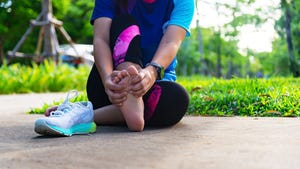 ankle sprained young woman suffering from an ankle injury while exercising and running, sports and medical concept healthcare and sport concept