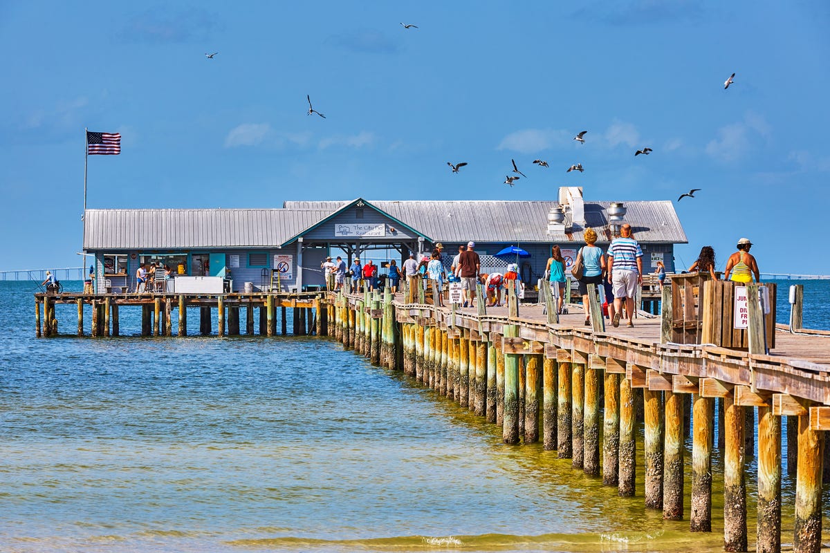 preview for 20 of the Most Charming Beach Towns Across America