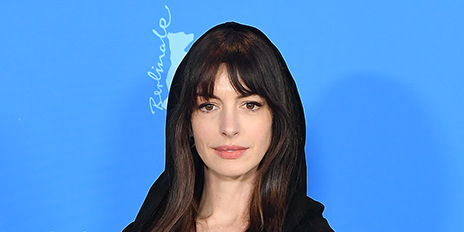 Anne Hathaway stuns with bouffant millennial side part hairstyle