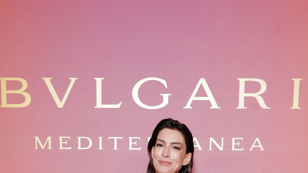 Anne Hathaway Glitters in Versace Dress at Bulgari Jewelry Show