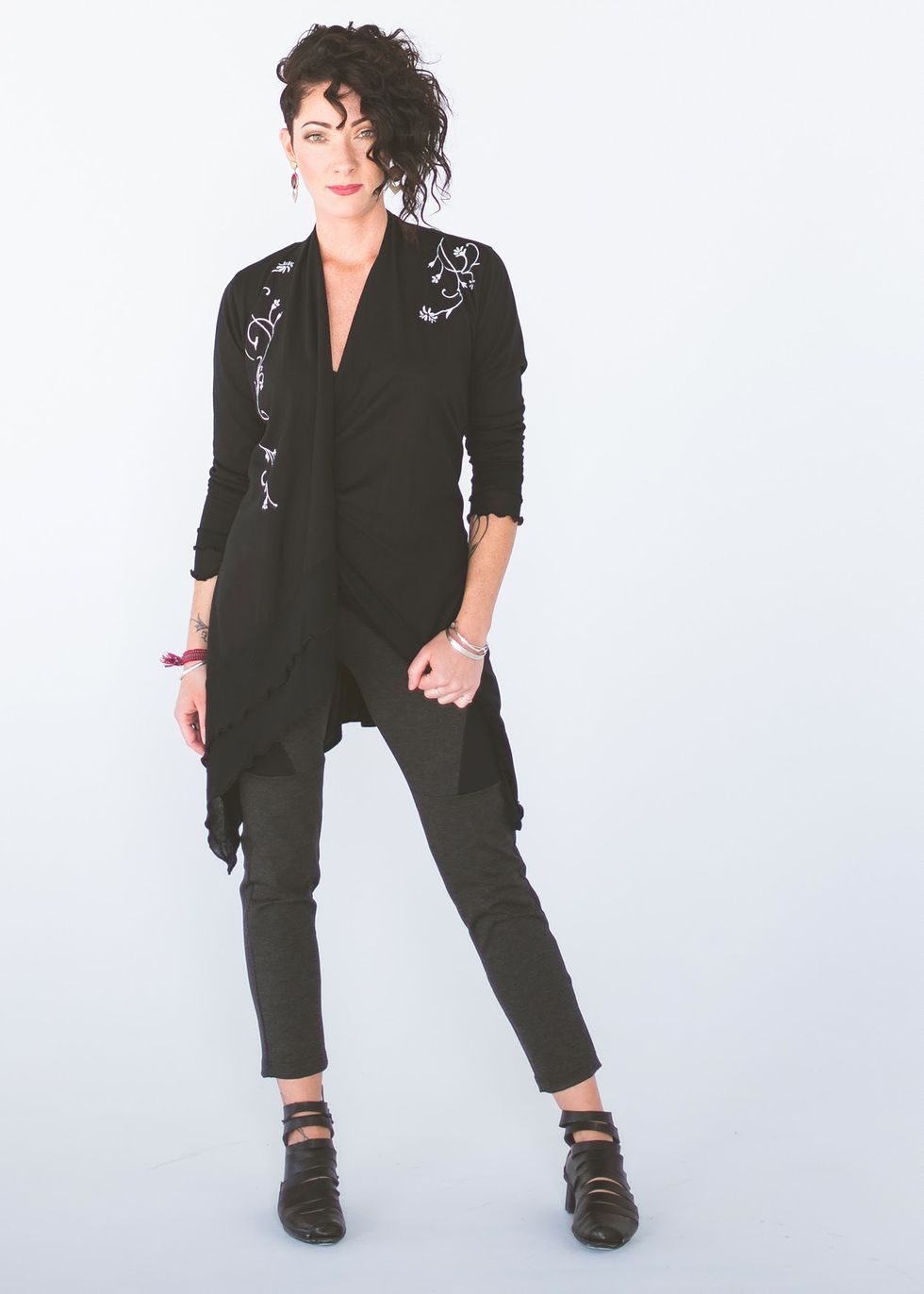 dandeneau wears her bamboo cardigan in black with a heritage design called catherine’s vine