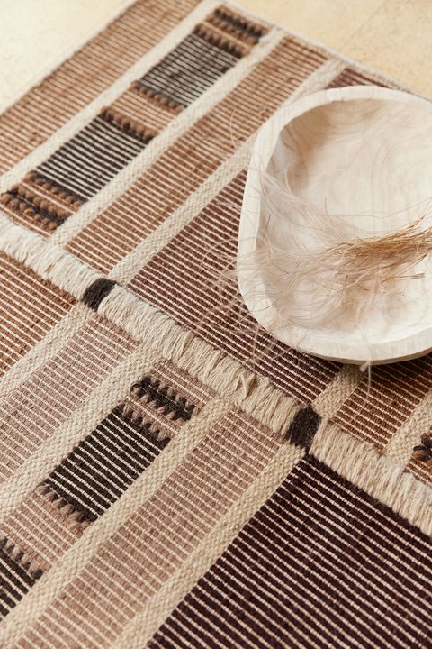 woven brown and tan rug