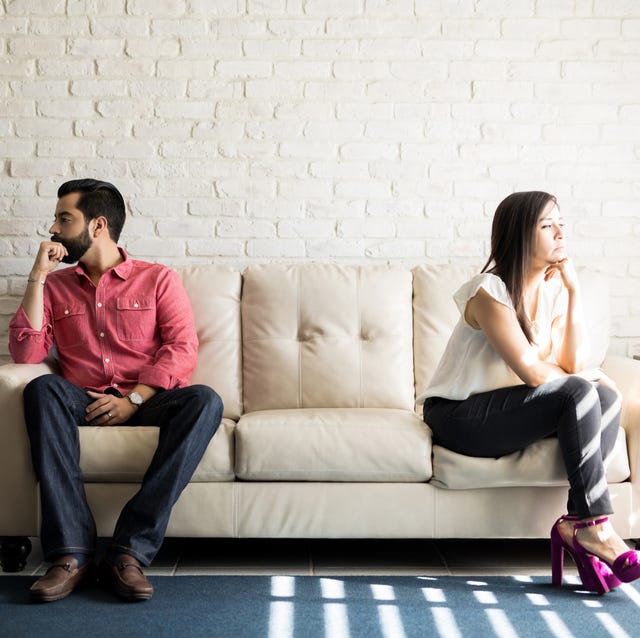 annoyed couple ignoring each other