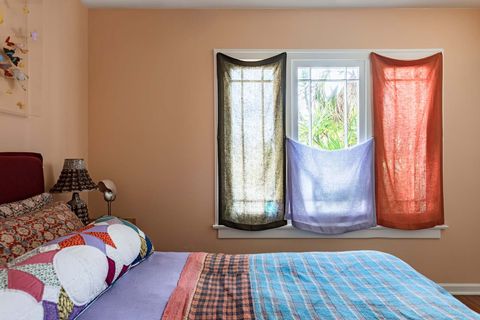 bedroom with curtains in 3 colors