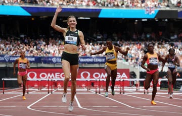 a group of people running on a track