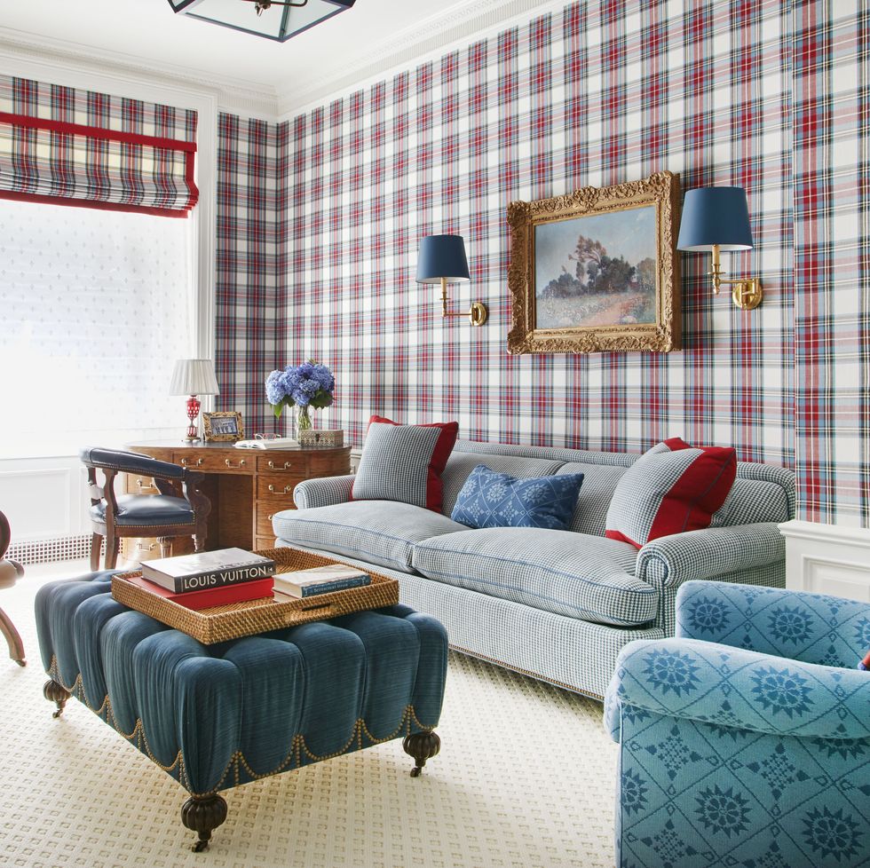 a radiant office is dressed in a lee jofa tartan pattern recolored specifically for this room and the armchair upholstery is inspired by an early american weaving and the leather chair is antique english