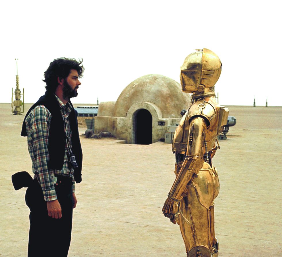 George Lucas with C-3PO on the set of Star Wars Episode IV - A New Hope