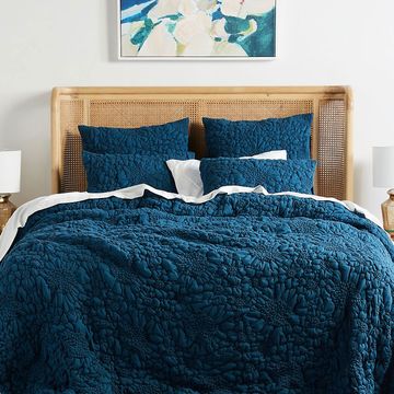 anthropologie pebbled quilt on bed