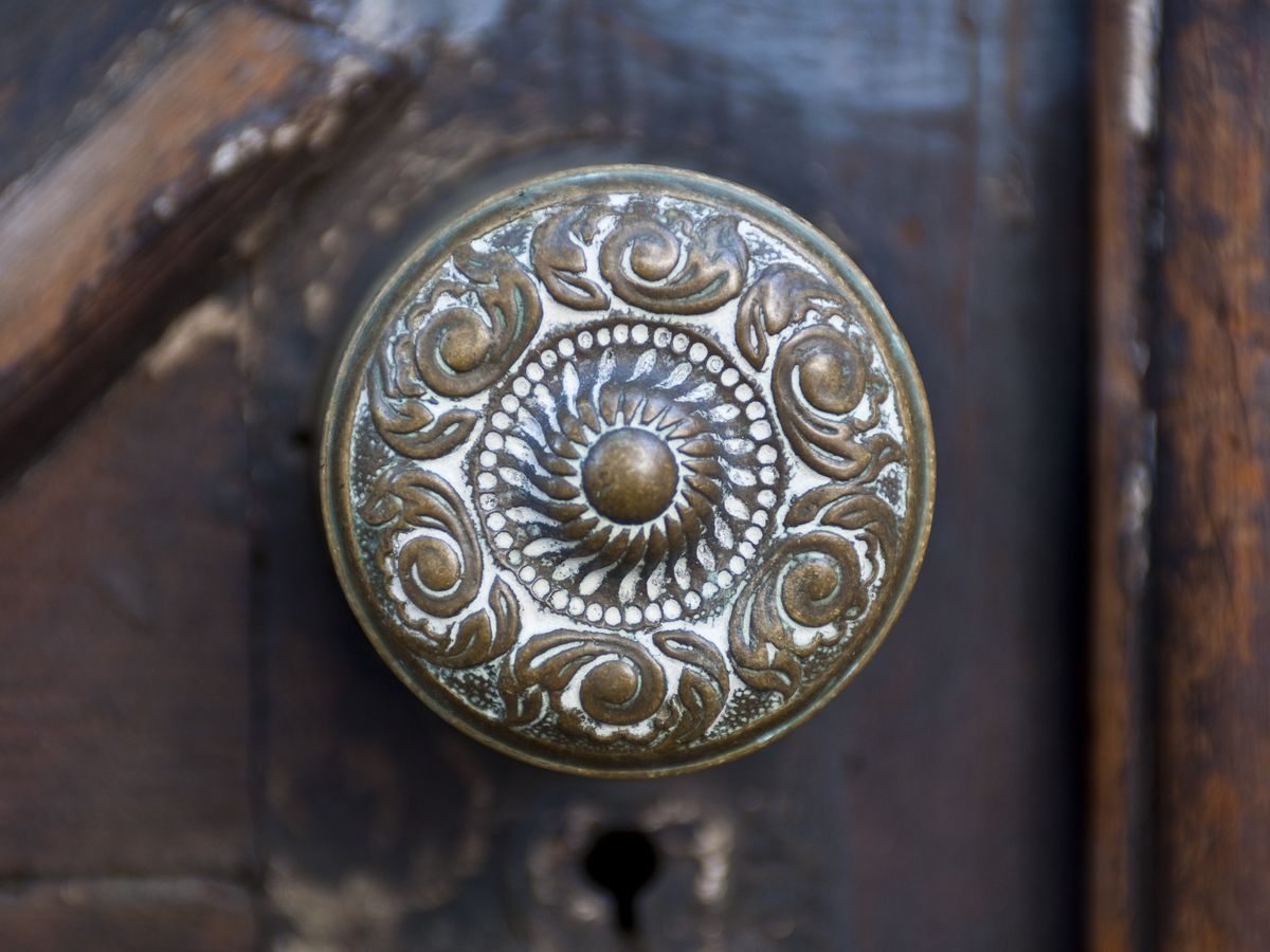 How do I clean antique brass drawer pulls?
