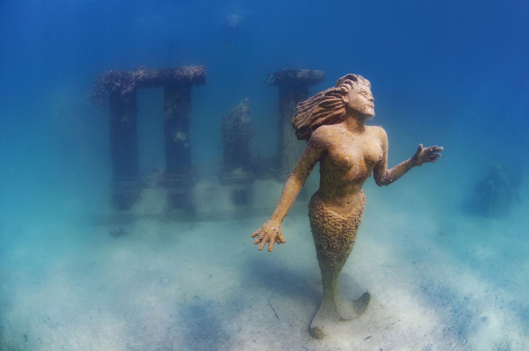 https://hips.hearstapps.com/hmg-prod/images/antique-underwater-archaeological-mayan-ruins-royalty-free-image-1591268624.jpg