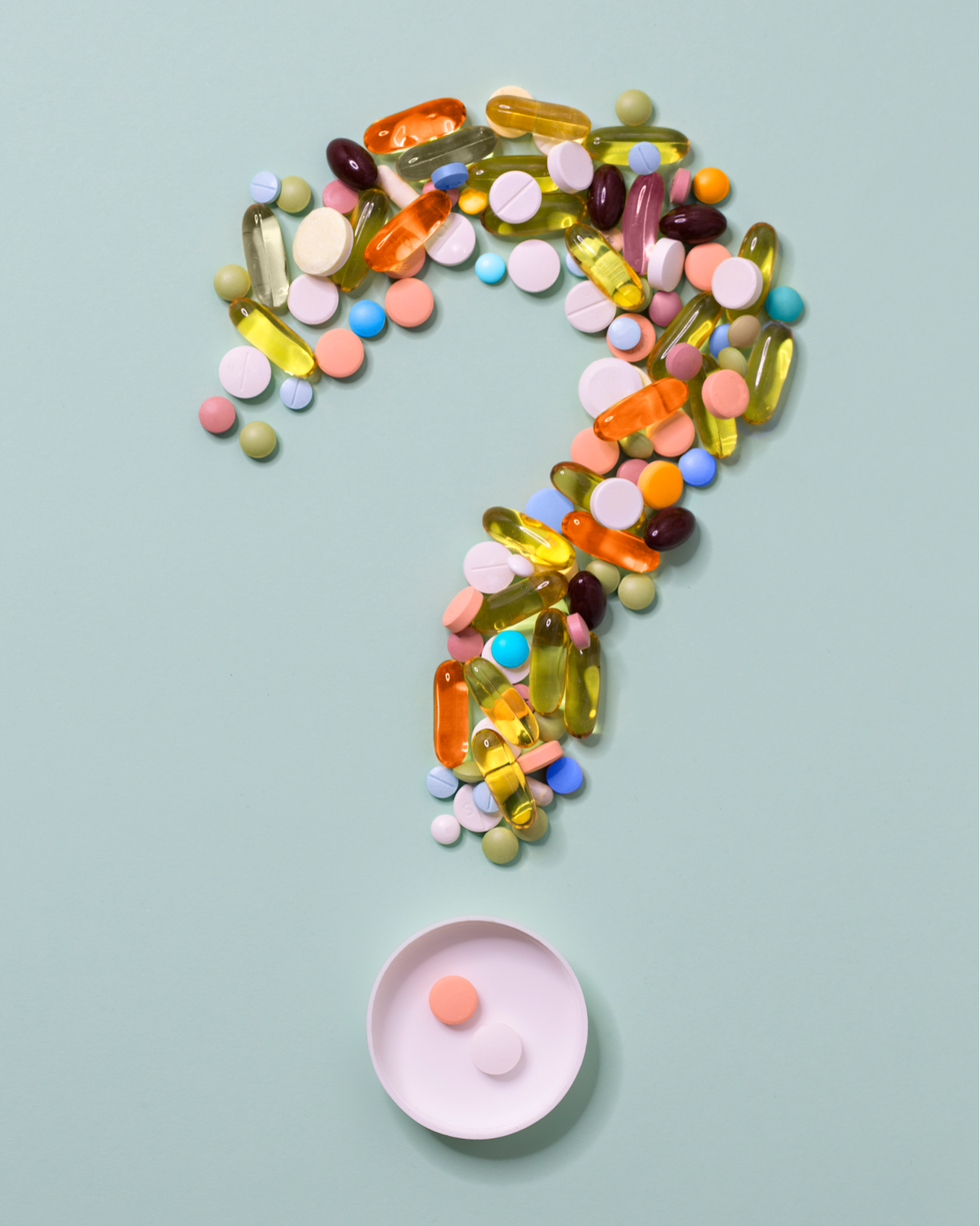 question mark with pills
