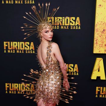 anya taylor joy wears an all golden outfit with spiked embellishments to the premiere of furiousa a mad max saga
