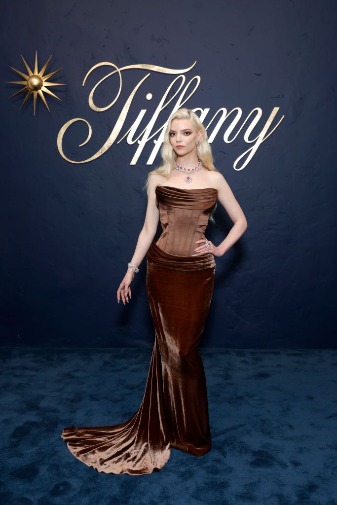 anya taylor joy wears a chocolate brown gown to the tiffany co launch of the blue book