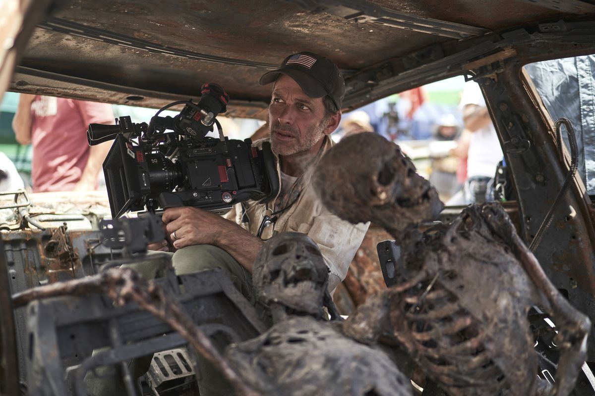 army of the dead l to r zack snyder director, producer, writer in army of the dead cr clay enosnetflix © 2021