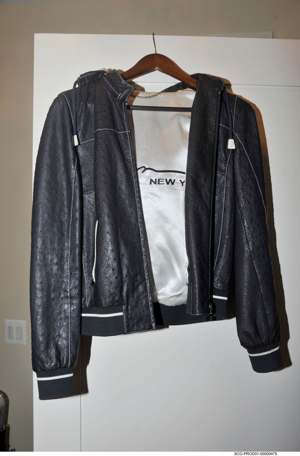 Clothing, Jacket, Leather, Clothes hanger, Leather jacket, Outerwear, Textile, Sleeve, Top, 
