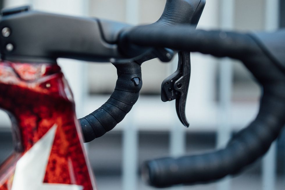 Bicycle handlebar, Bicycle part, Red, Bicycle wheel, Bicycle, Vehicle, Bicycle frame, Road bicycle, Metal, 
