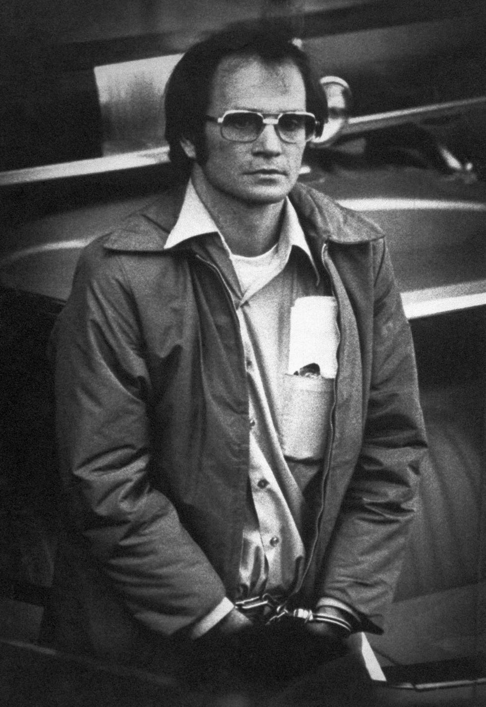 james w. lewis, who is on trial in chicago for attempted extortion in the 1982 tylenol poisonings, was described by the government in closing arguments thursday, october 27, 1983 as a "scheming diabolical" man. lewis is shown in january when he arrived in federal court in kansas city for a hearing on unrelated charges