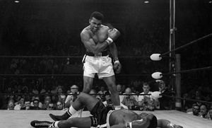 Muhammad Ali stands over Sonny Liston after dropping Liston with a short hard right to the jaw on May 25, 1965, in Lewiston, Maine
