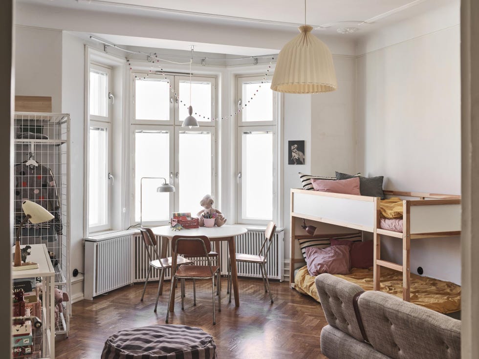 habitación infantil con zona de juegos