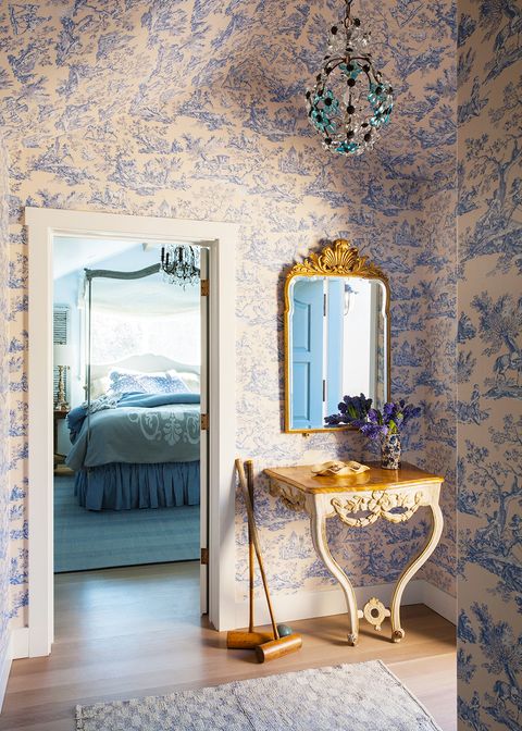 hallway with blue wallpaper