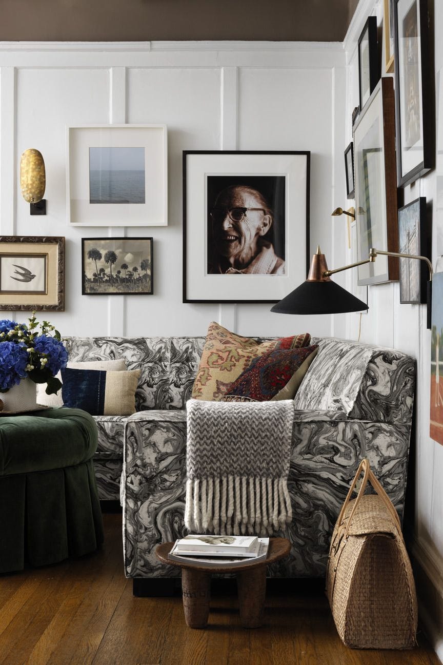 a living room with a couch and a table